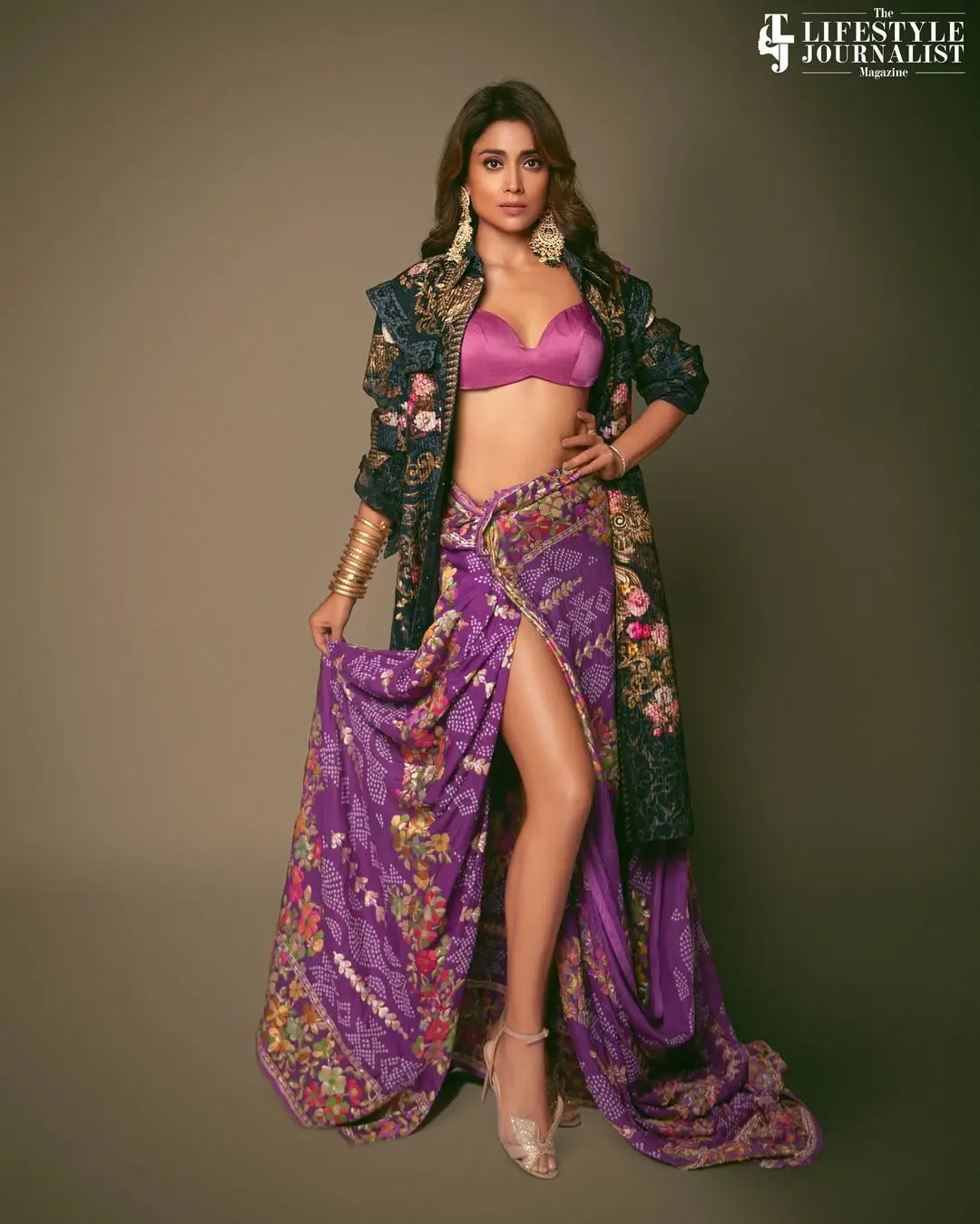 Shriya Saran Long Legs Show in Violet Lehenga Choli